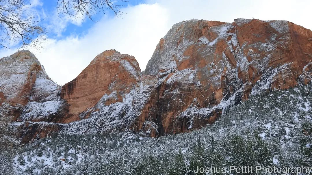 Snow-covered red sandstone cliffs in southwest Utah